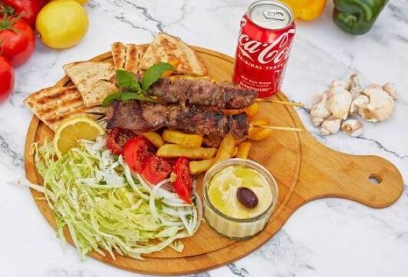 Kalamaki lamb with portion of chips and drink