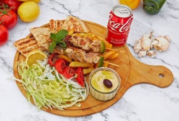 Kalamaki chicken with portion of chips and drink
